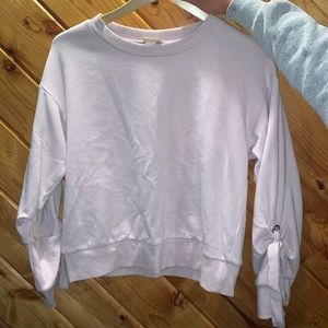 Cropped crew neck with bow sleeves